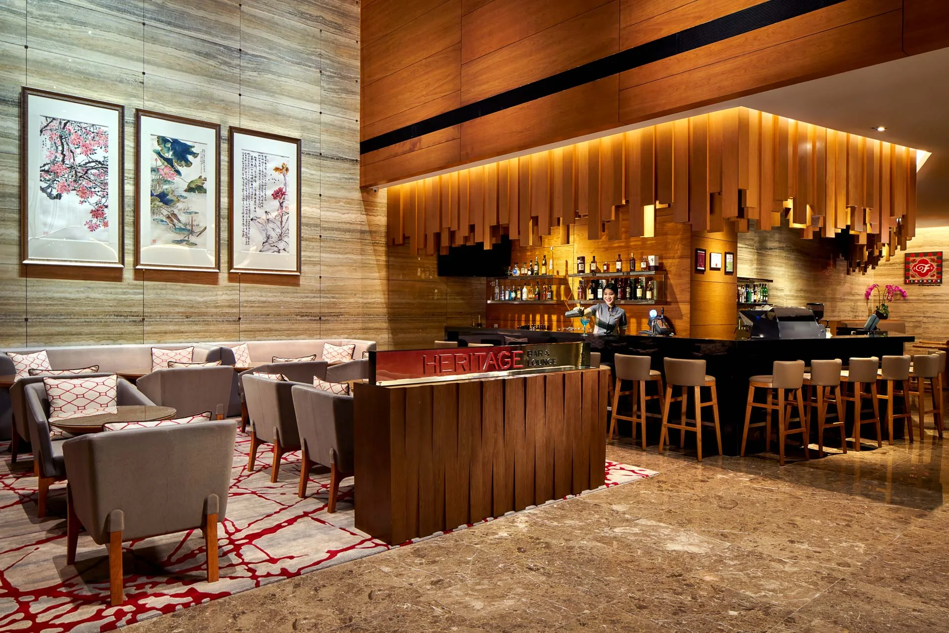 Heritage bar with Chinese scroll paintings and sculptural wood canopy