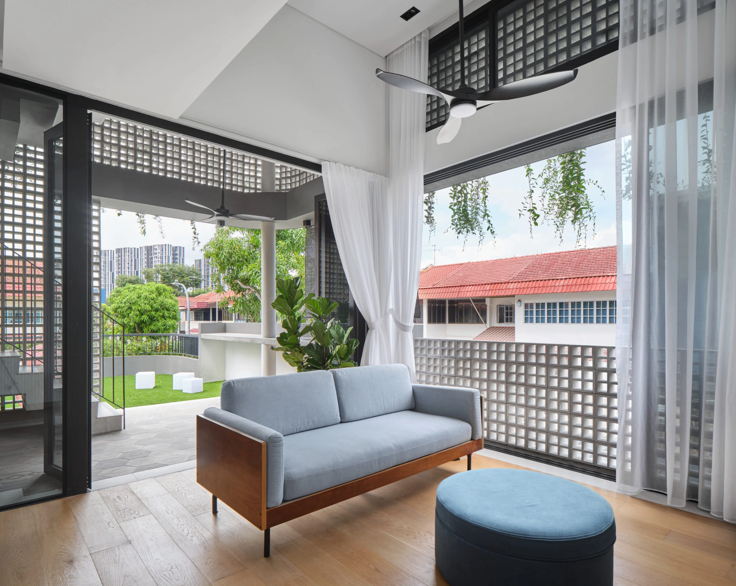 Cozy lounge space with garden view.