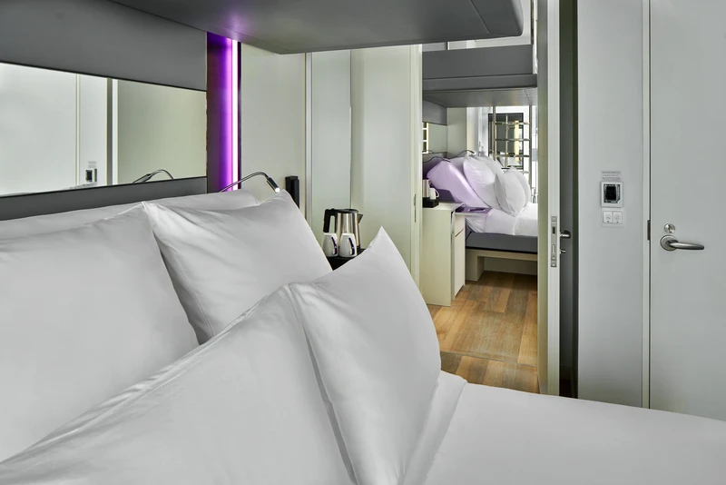 Connecting family cabins with purple LED strip through sliding doors