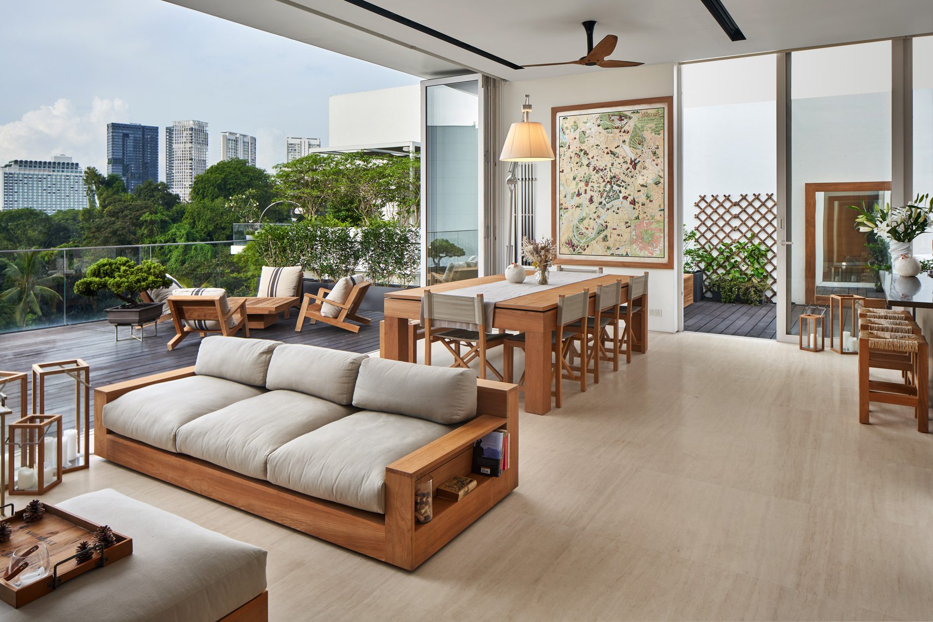 Living area with dining table arrangement and garden views