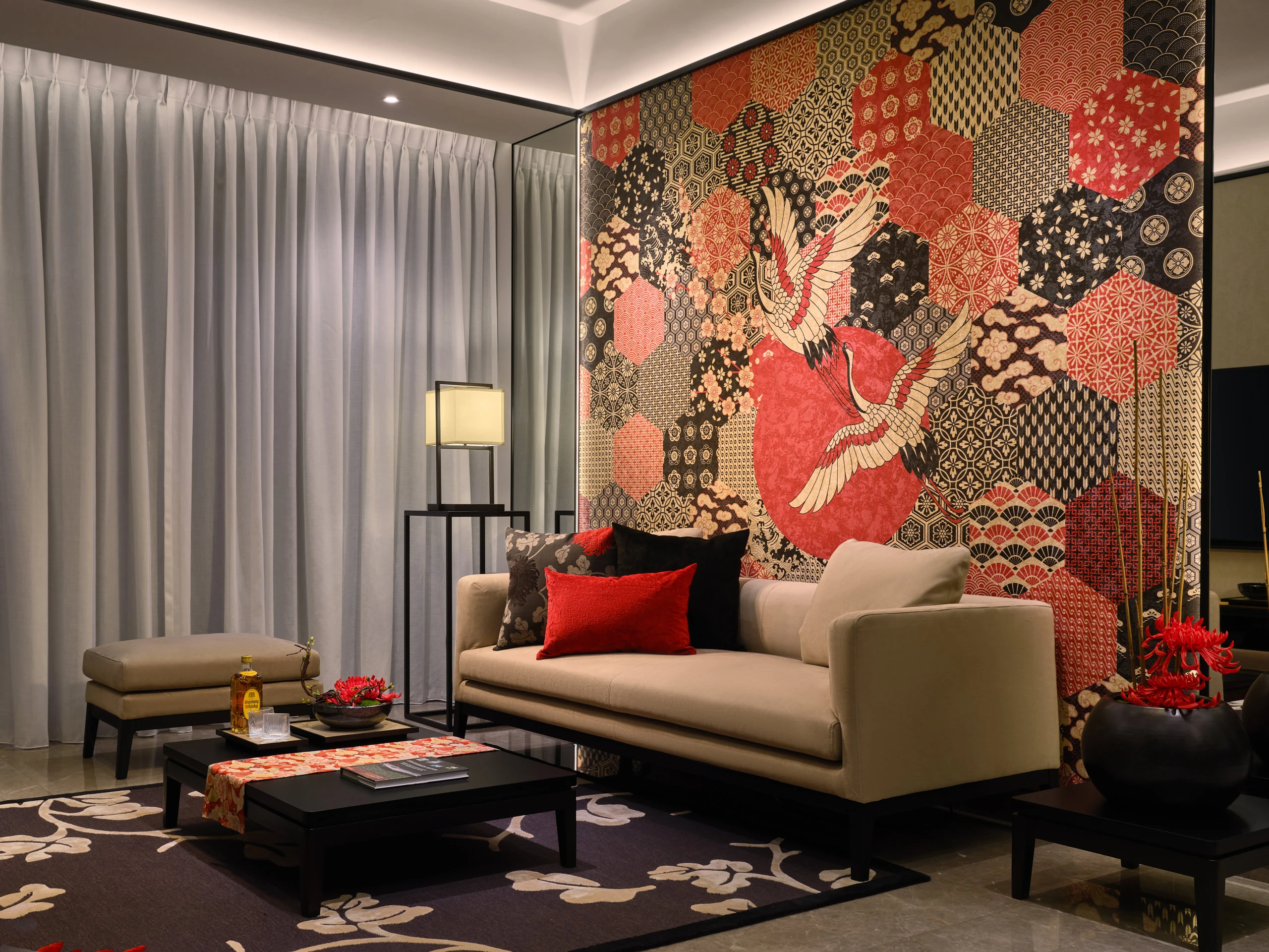 Living room with crane mural, black lacquer table and floral silk runner