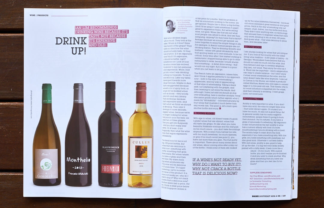 Wine bottles on white background with translucent ruby backlighting