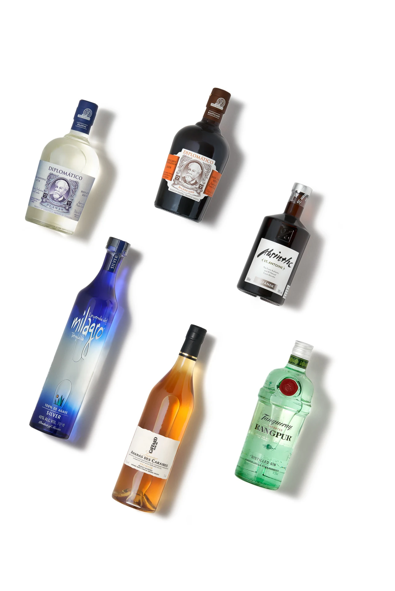 Spirit bottles on white background with studio lighting