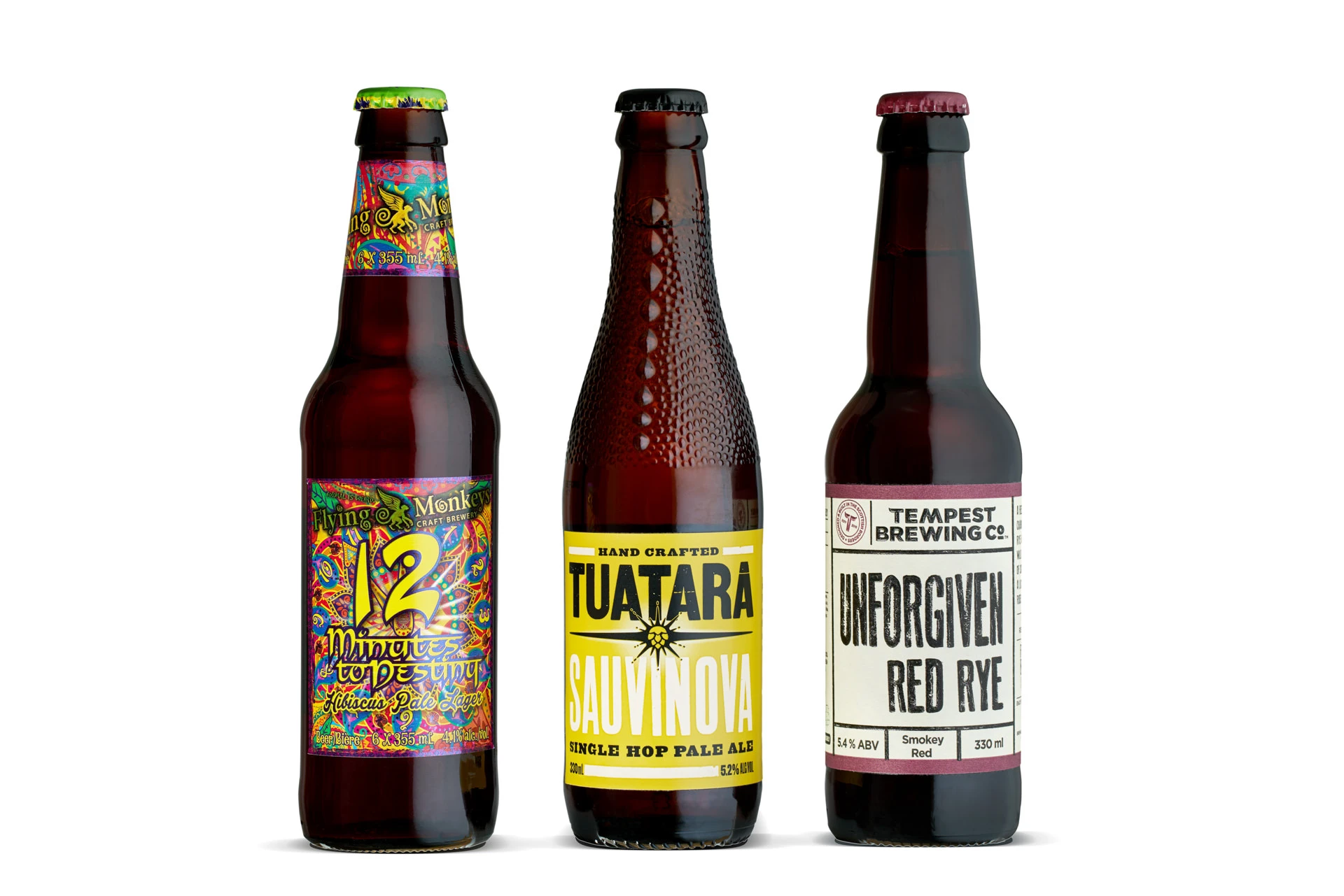 Craft beer bottles on white seamless background with studio lighting