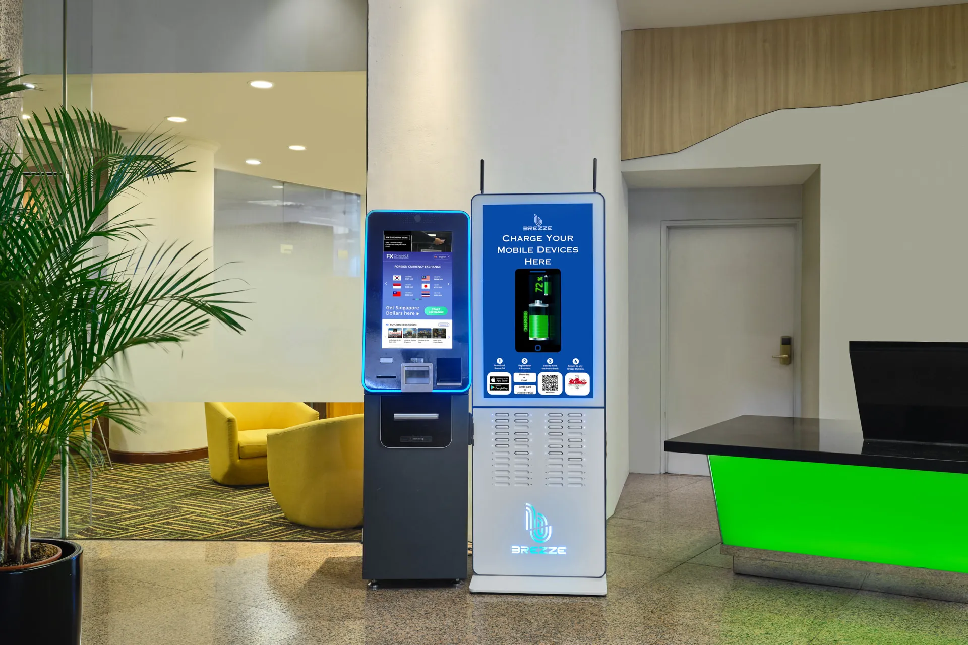 Currency exchange kiosk and charging station in hotel lobby — Holiday Inn Atrium Singapore hotel photography