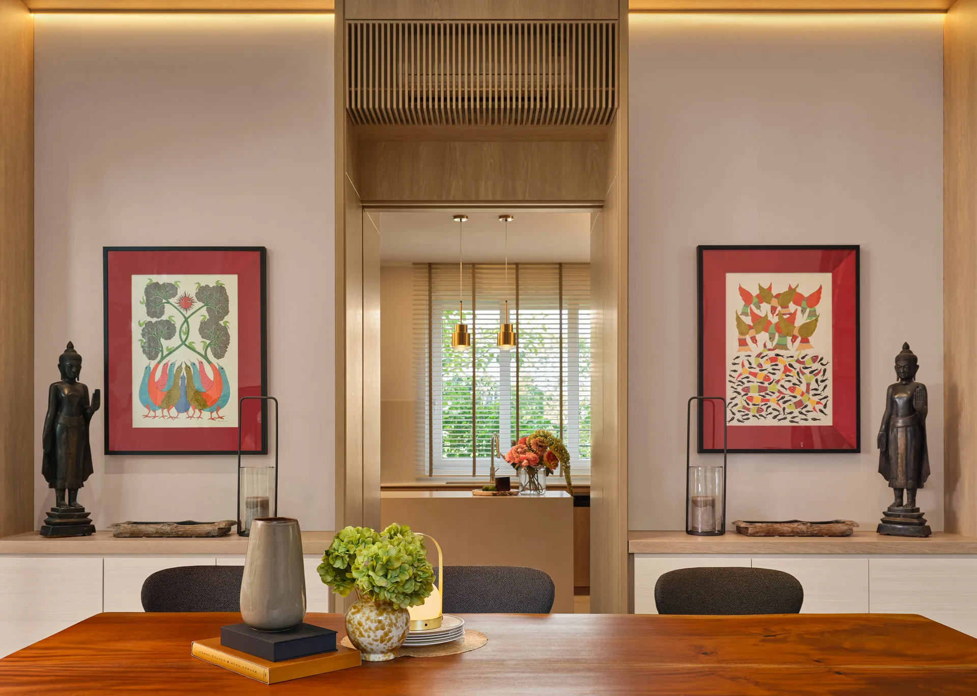 Dining room with Buddha niches, folk art and slatted timber screen