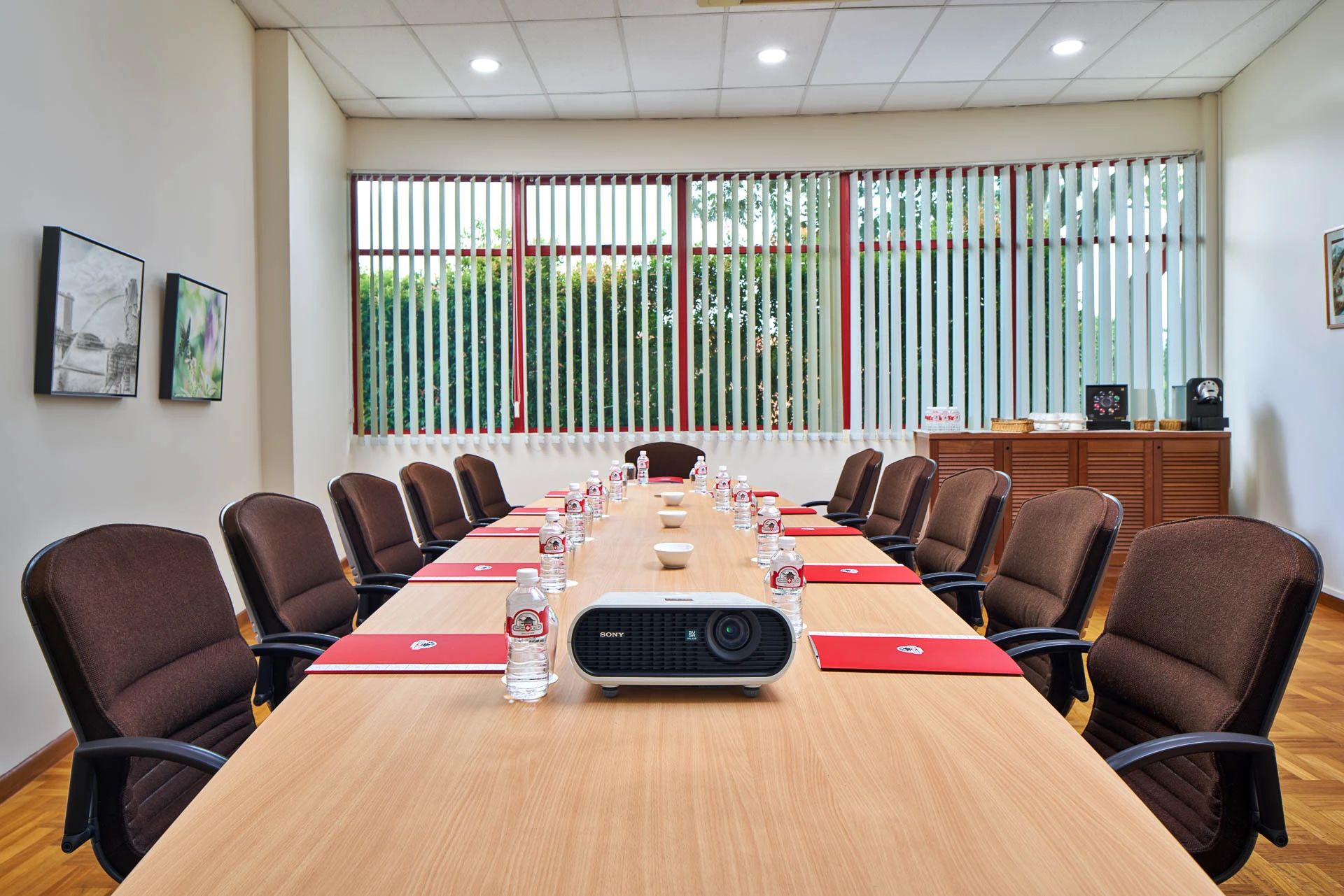 Boardroom with conference table and projector