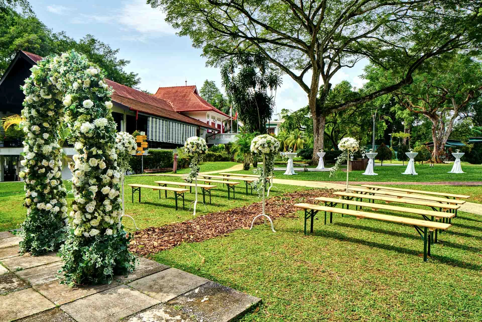 Garden ceremony from altar with colonial clubhouse beyond