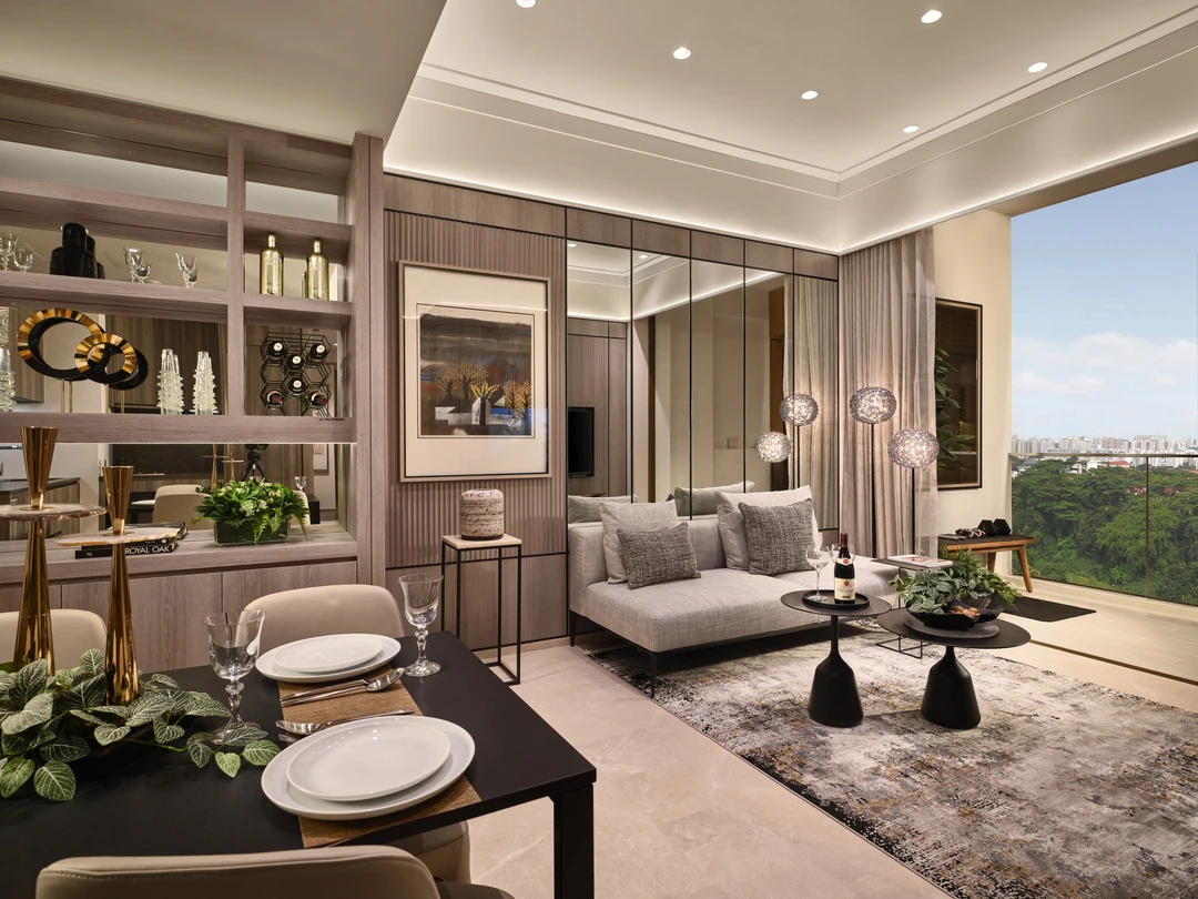 Living area with contemporary furniture, open shelving, and large windows in Klimt Cairnhill 2-bedroom showflat