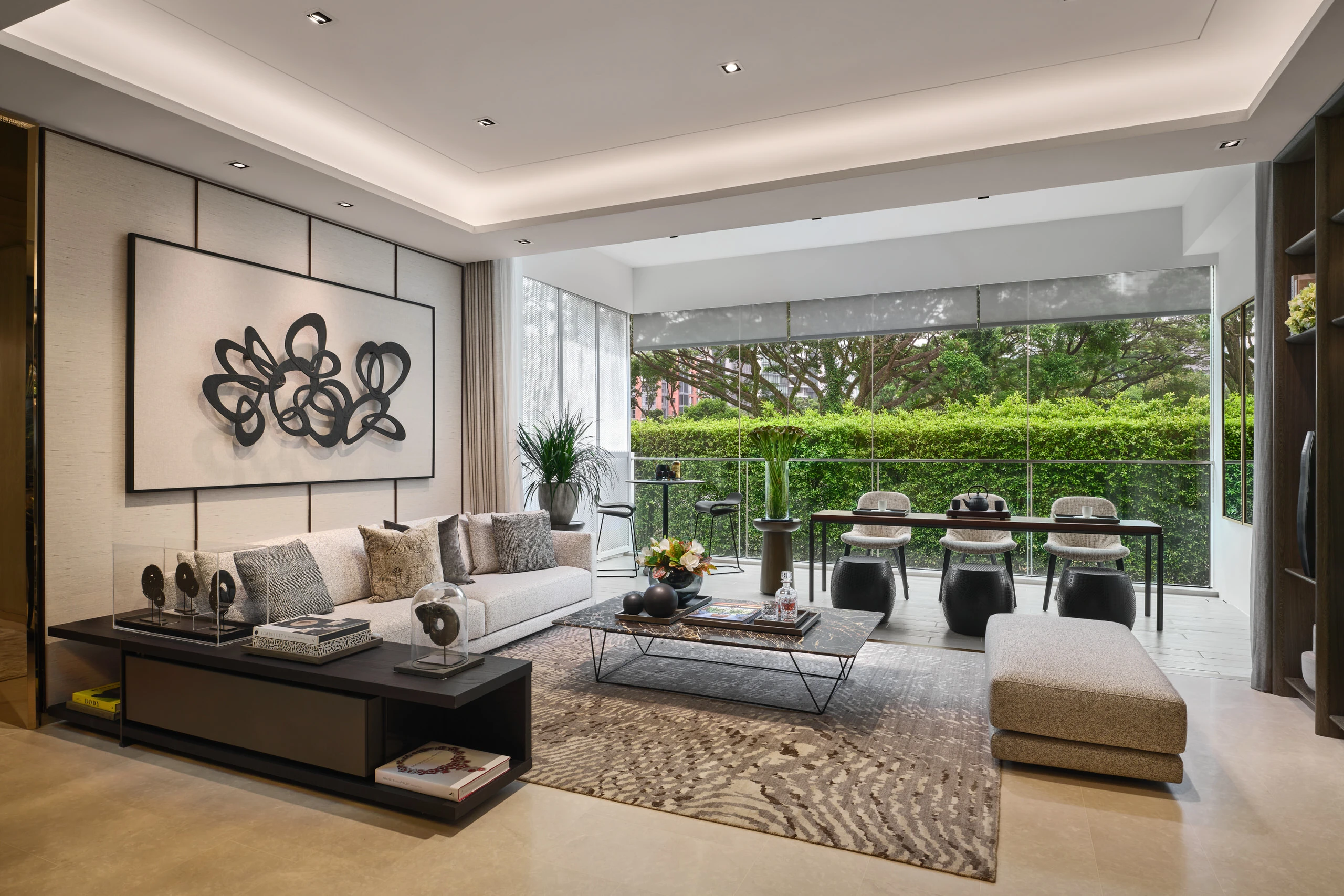 Spacious living room with outdoor view, contemporary decor, and natural light in Klimt Cairnhill 3-bedroom show suite