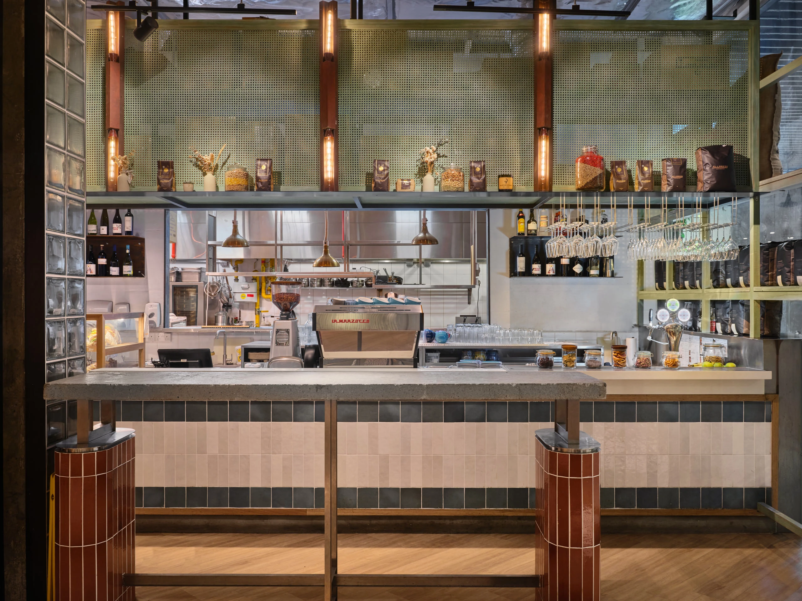 Front counter with coffee bar and open timber shelving