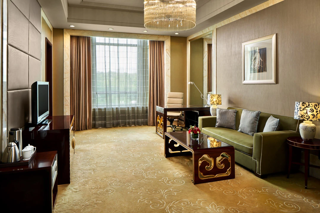 Executive suite with living area and modern furnishings — Crowne Plaza Ordos hotel photography