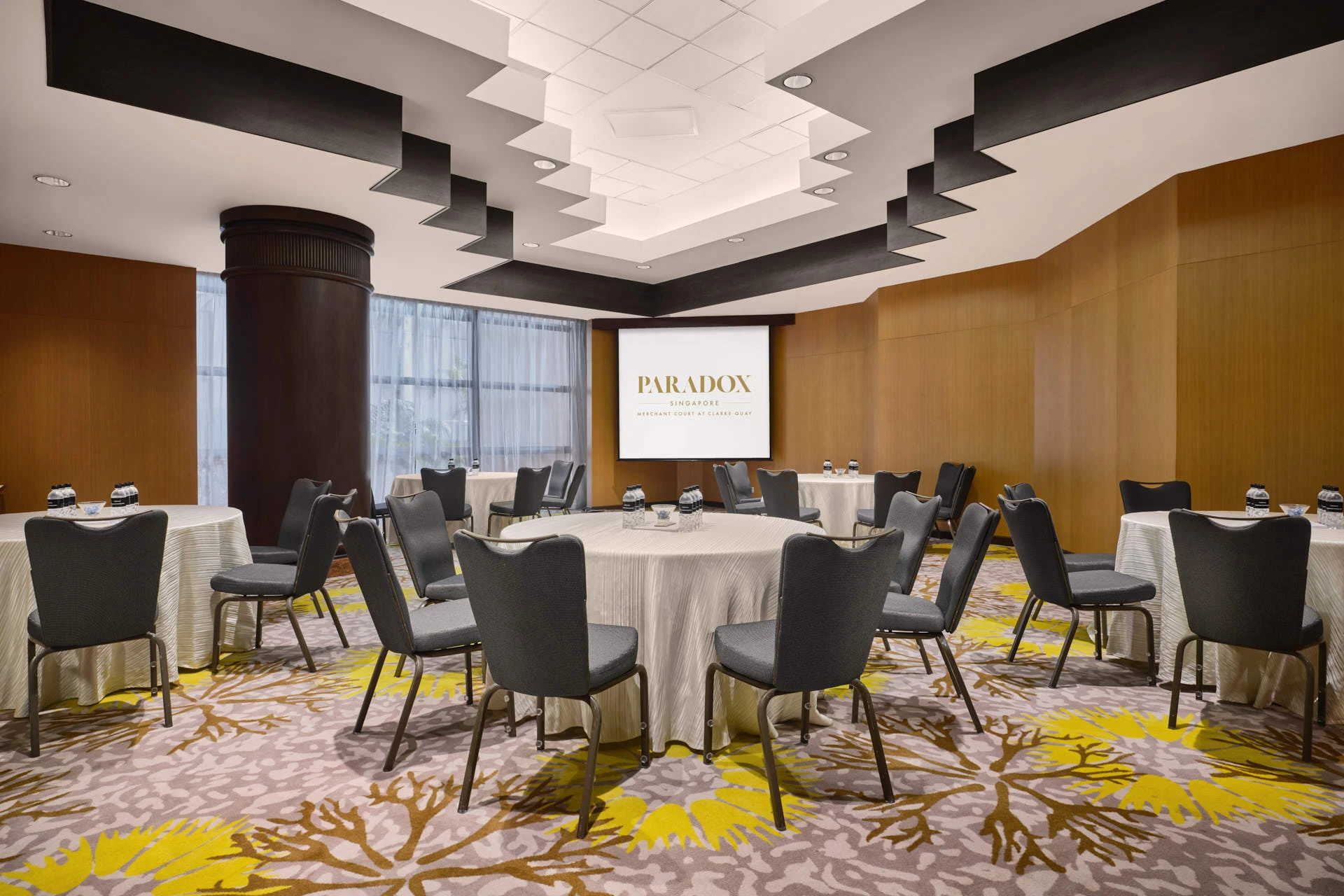 Paradox Singapore Sandalwood Room cabaret setup with geometric ceiling sculpture and sheer curtains