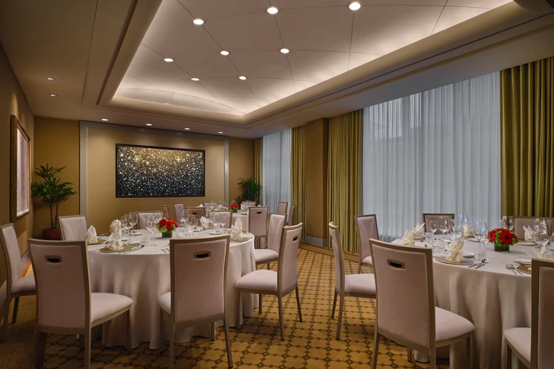 Conrad Singapore Marina Bay Salon 3 in social event setup with intimate meeting room seating and soft hotel lighting