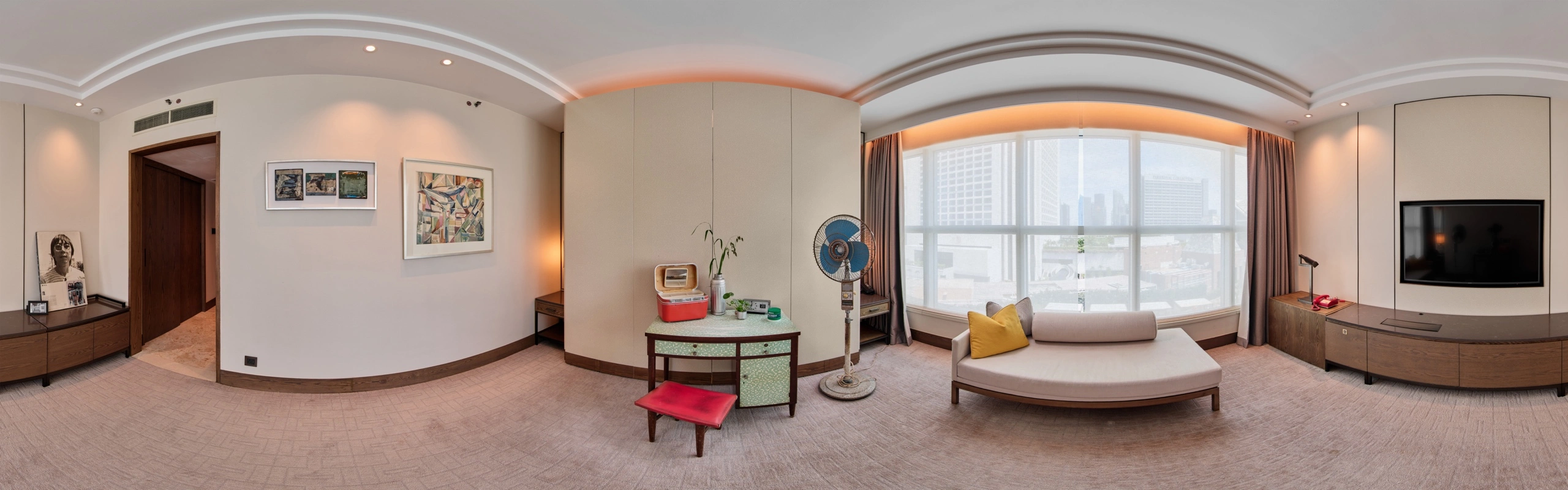 Panoramic view of a #GBK85 exhibition suite displaying framed works and objects from Goh Beng Kwan’s career