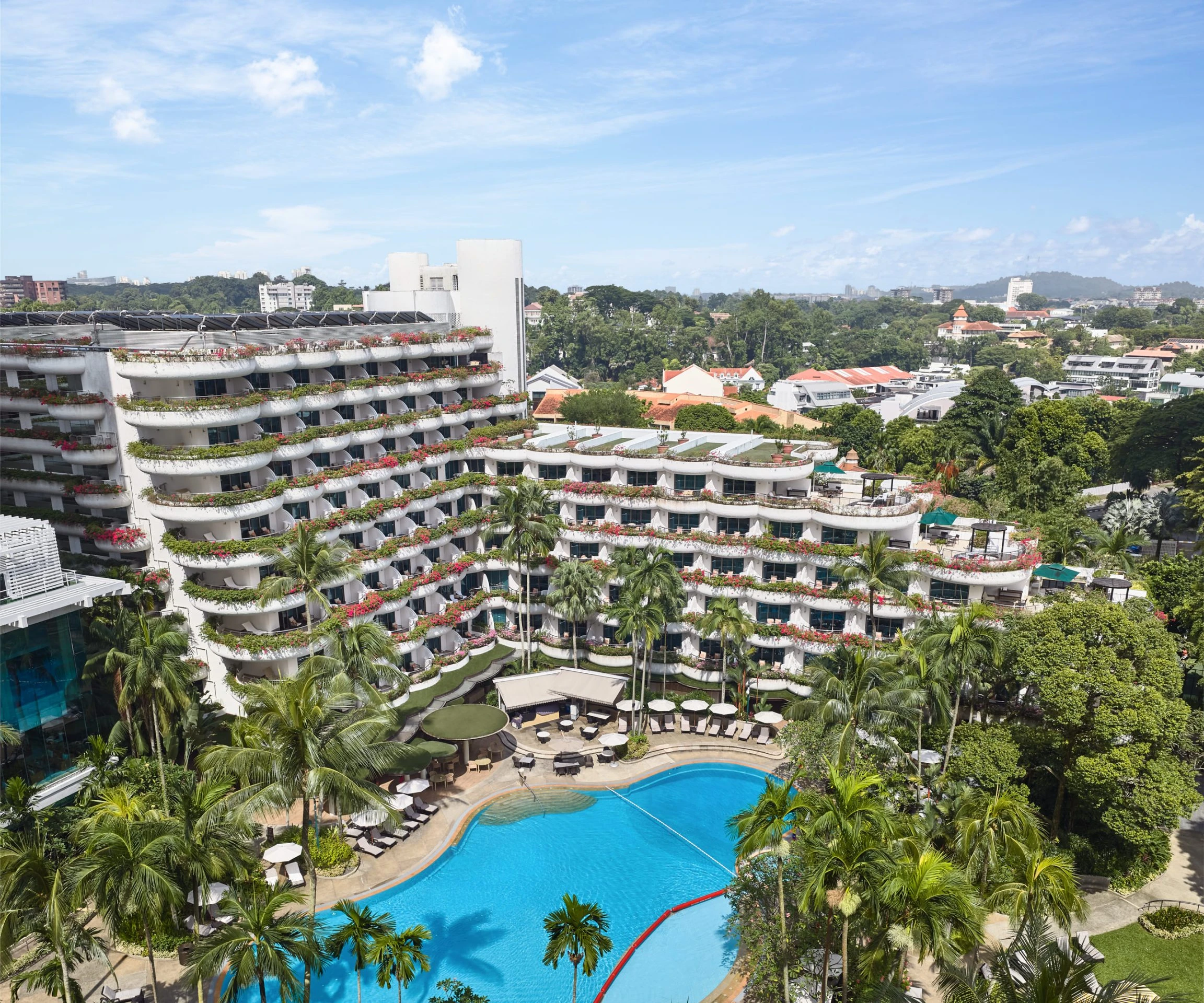 Shangri-La Hotel Singapore terraced garden facade with tropical planting on balconies