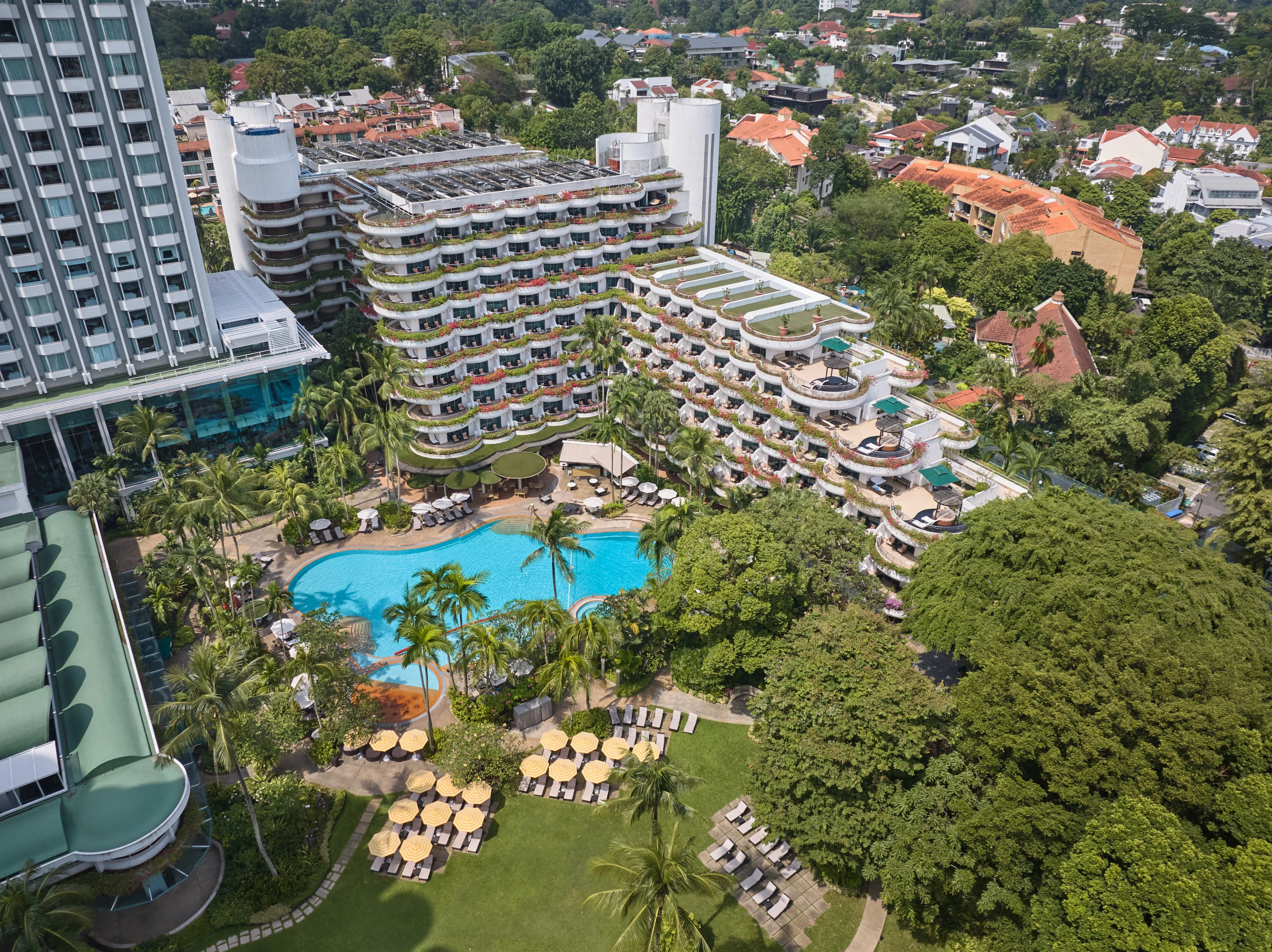 Aerial view of Shangri-La Hotel Singapore tropical gardens and resort pool