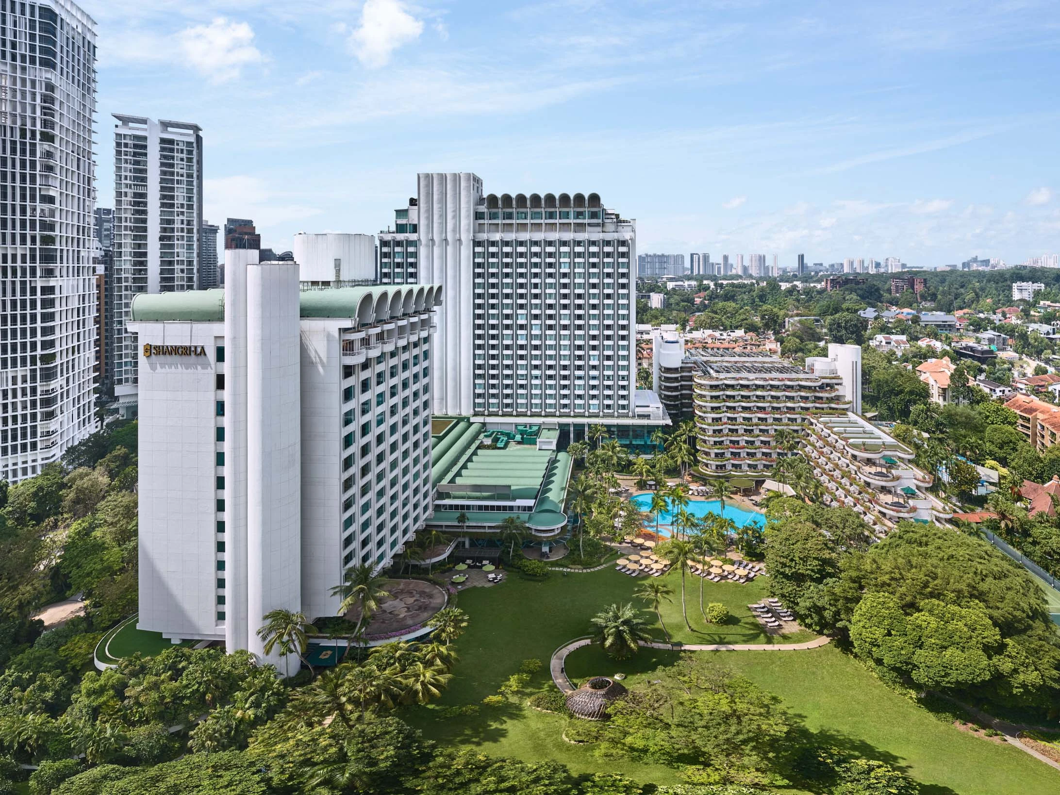 Aerial drone panorama of Shangri-La Hotel Singapore and Orchard Road skyline