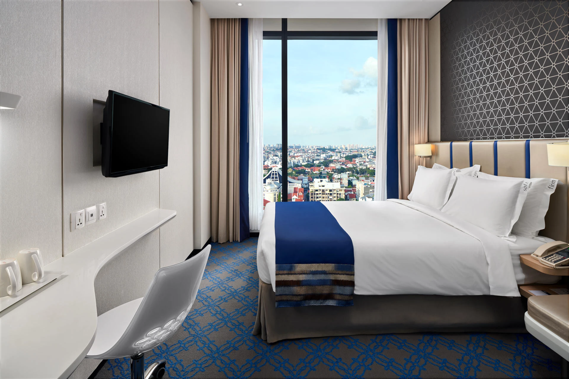 Queen room with floor-to-ceiling Singapore cityscape view — Holiday Inn Express Katong hotel photography