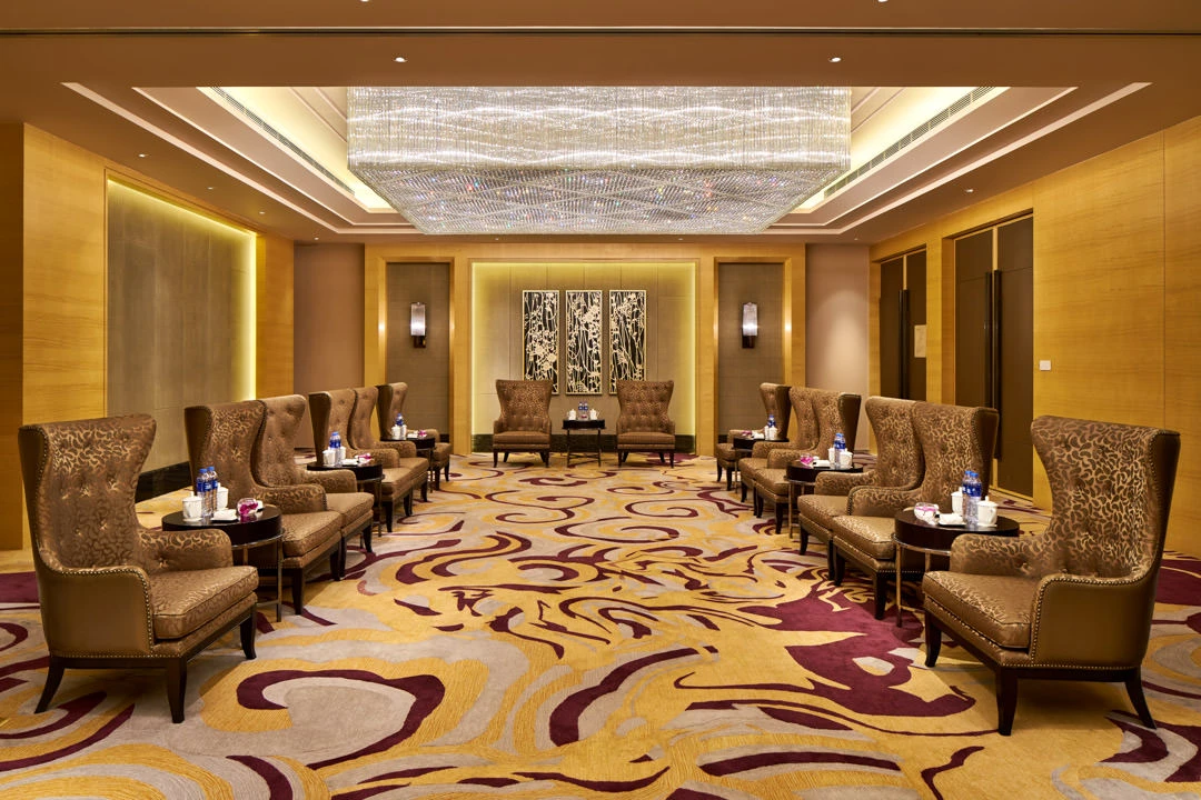 VIP meeting room with premium furnishings and formal setup — Crowne Plaza Tianjin Jinnan function room photography
