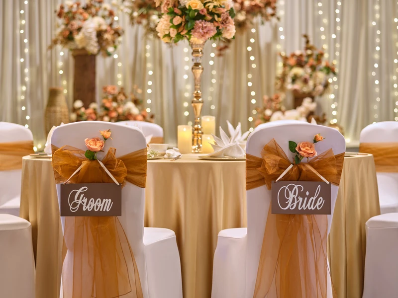 voco Orchard Singapore wedding ballroom setup with rustic chairs