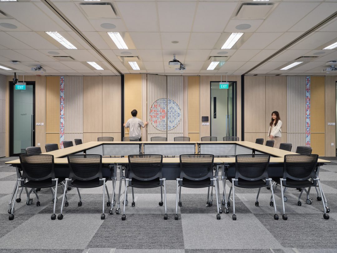 Modern conference room with circular table.