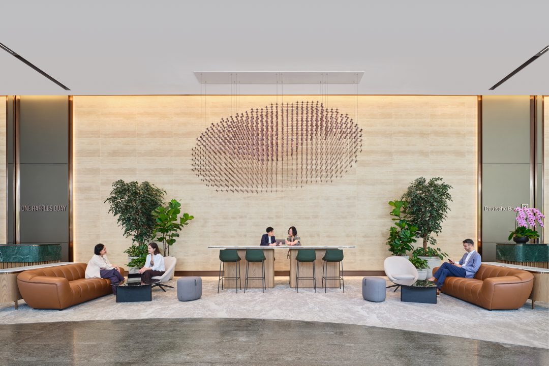 One Raffles Quay South Tower reception seating area with circular wall feature. Architectural photography for Gensler by Christopher O’Grady, Singapore.