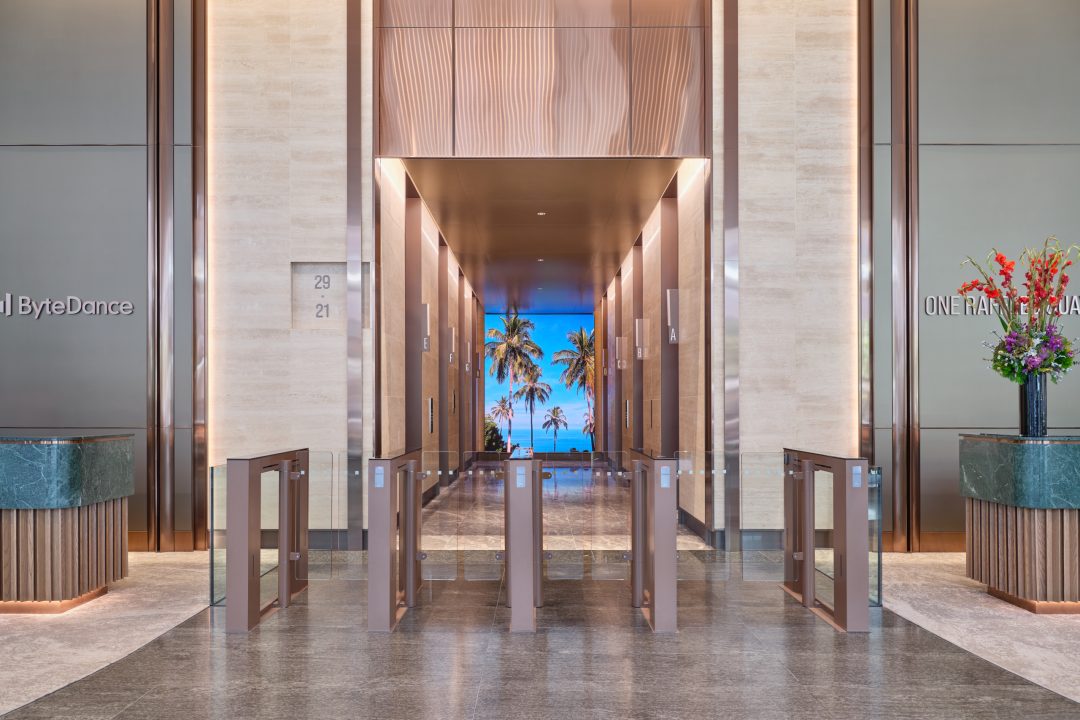 One Raffles Quay South Tower lift lobby, wider view to turnstiles. Architectural photography for Gensler by Christopher O’Grady, Singapore.